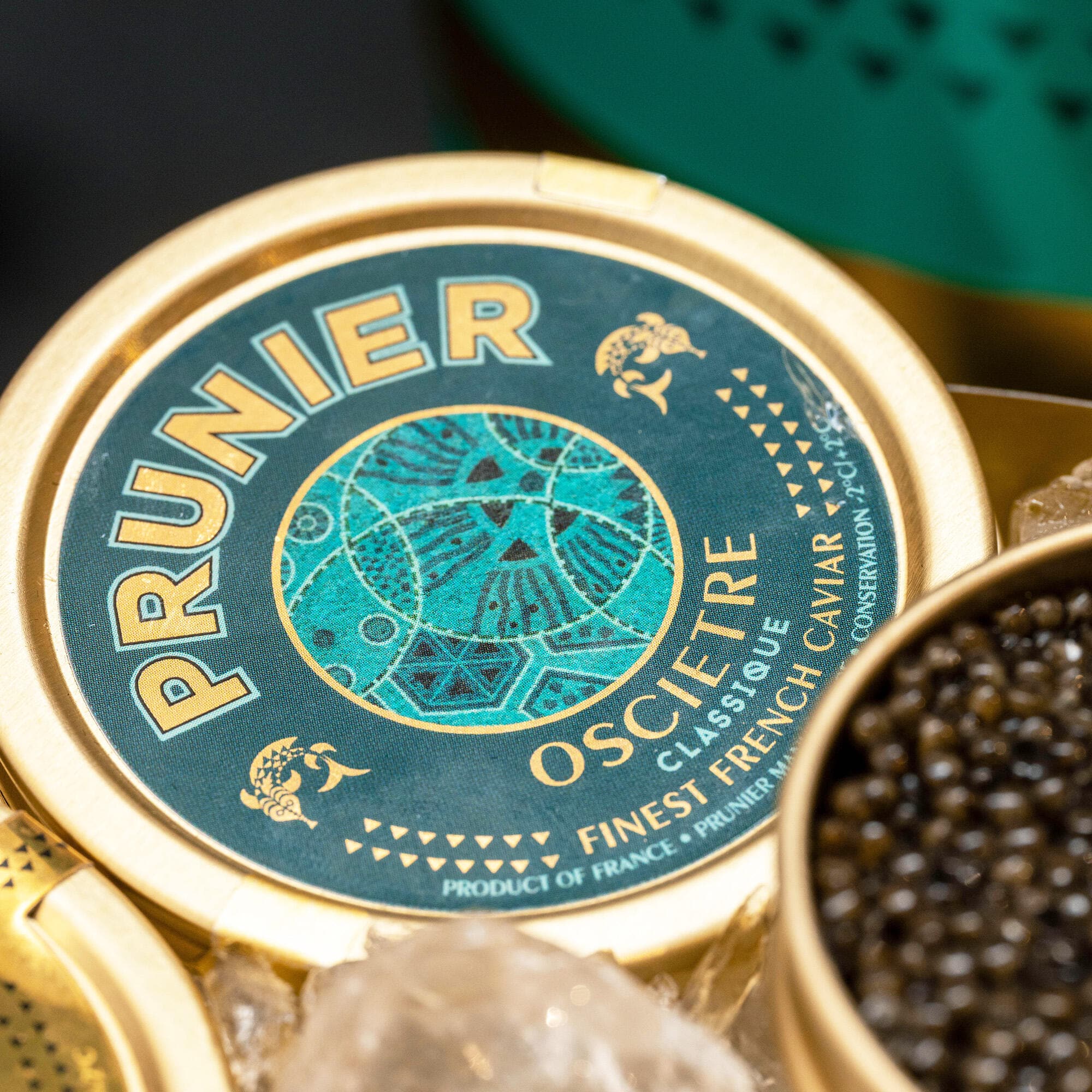 Turquoise tin of Prunier Oscietra Caviar Classic